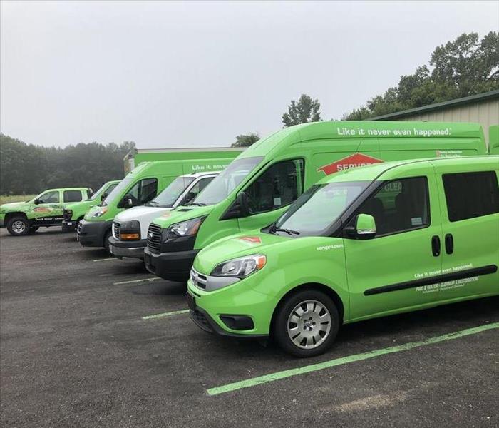 New Green SERVPRO vehicles parked in the SERVPRO of Lufkin lot, ready to go.