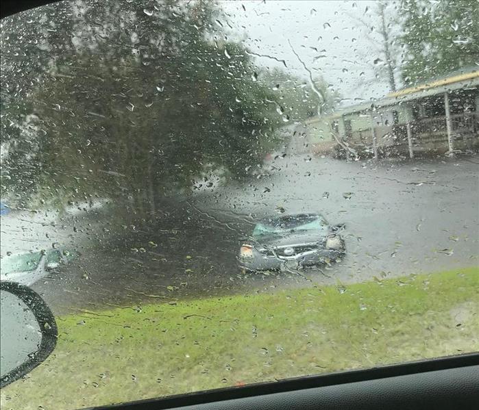 Flood waters overtaking a vehicle in Beaumont, Texas as Tropical Storm Imelda makes landfall.