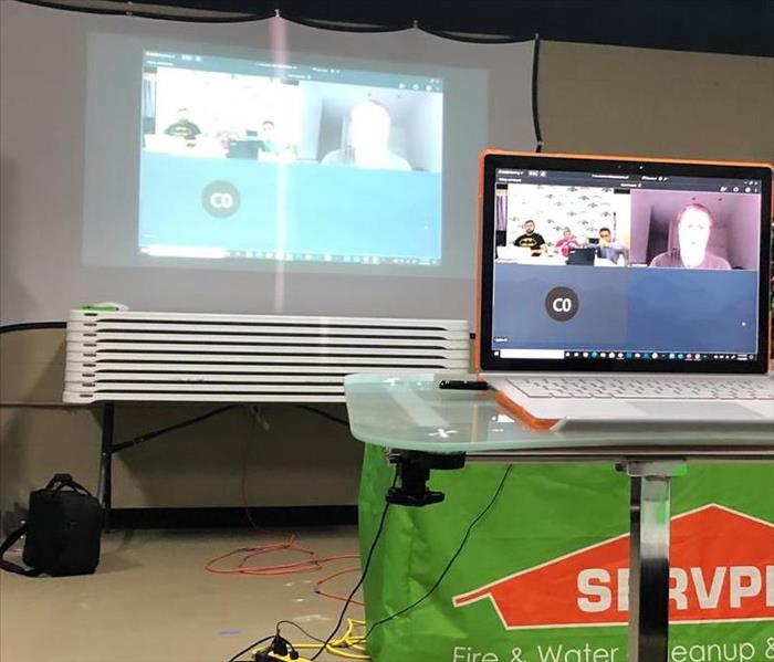 A computer screen featuring a Zoom call between SERVPRO Employees.