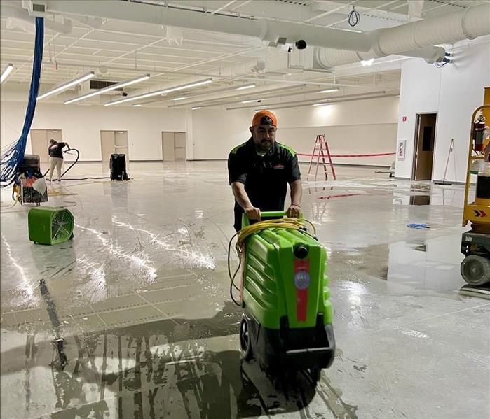 SERVPRO employee with extractor